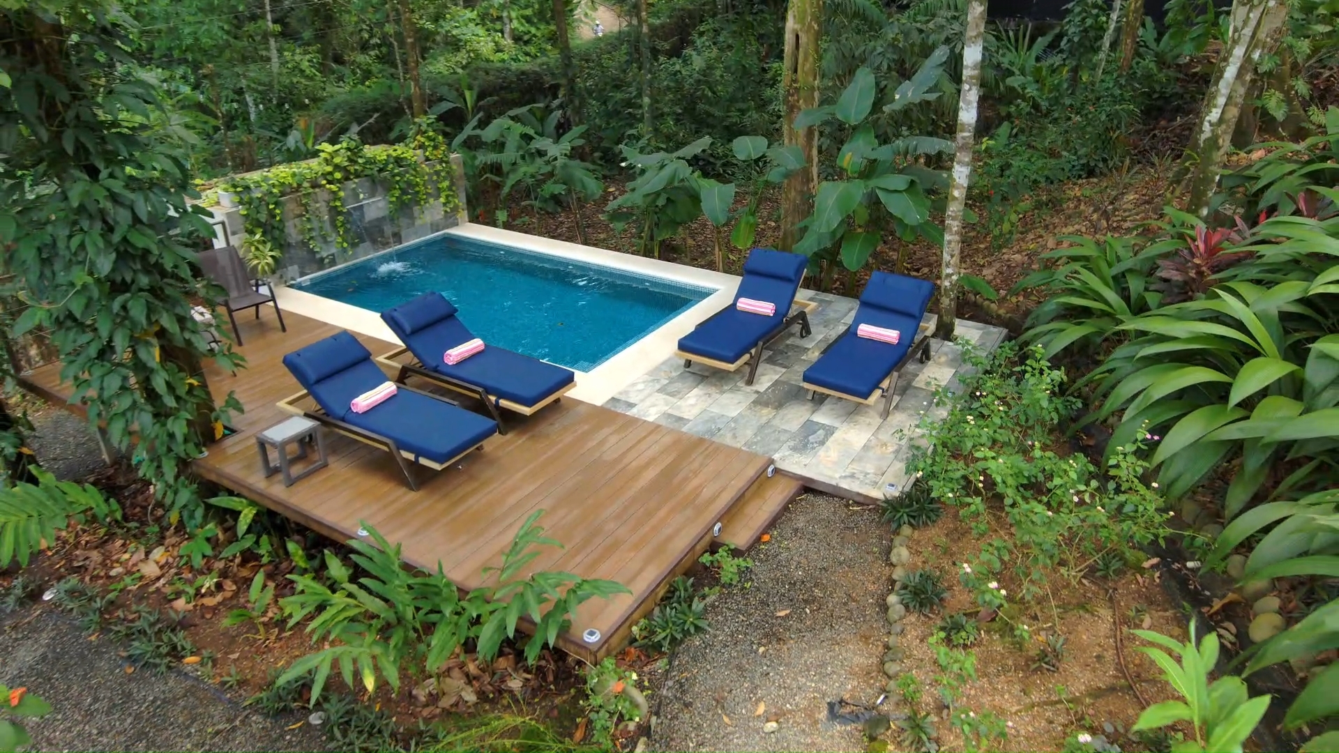 Daybed corner next to the rainforest pool