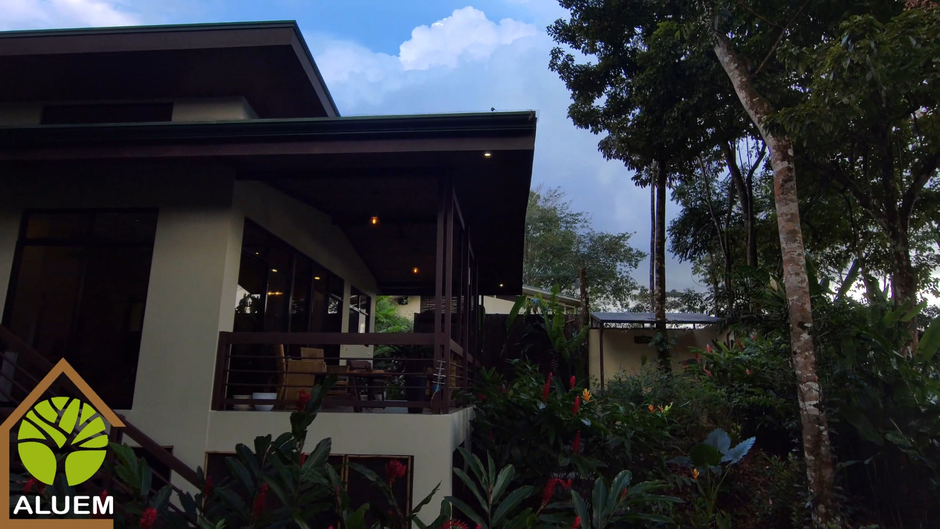 Open-air terrace lounge with rainforest views in Uvita